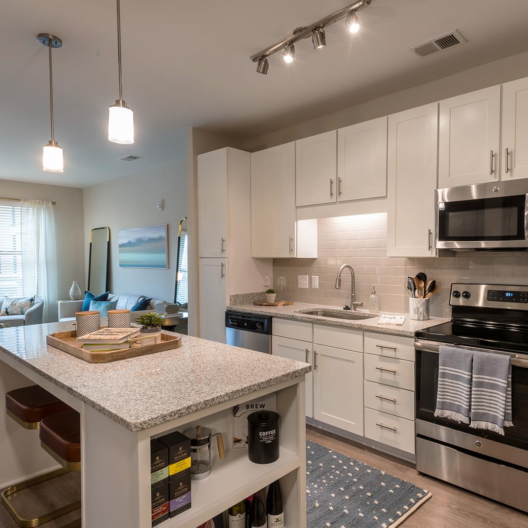 Unit Kitchen with Kitchen Island & Stainless Steel Appliances